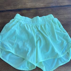 Lululemon hotty hot 4inch shorts. Almost a lime yellow color. Size 2